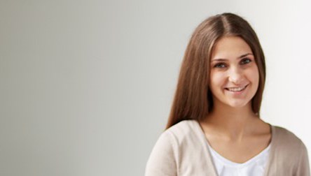 A smiling young woman